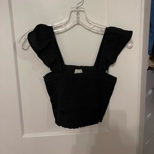 MP|C black ribbed crop top.